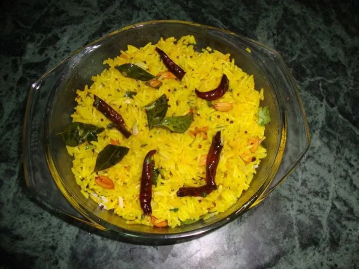 Lemon rice with peanuts, curry leaves and turmeric