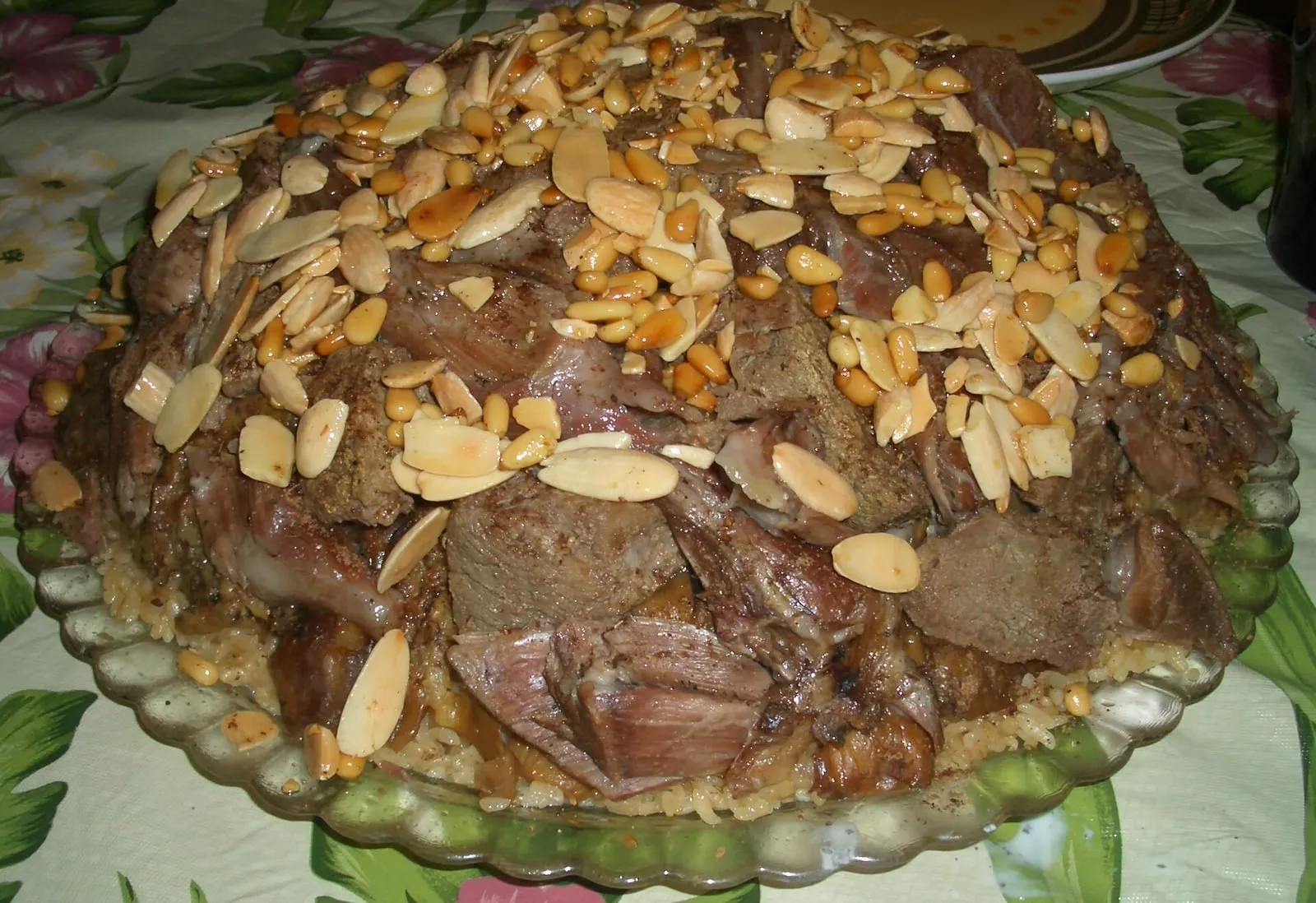 Saleeg creamy Hejazi rice topped with roasted chicken