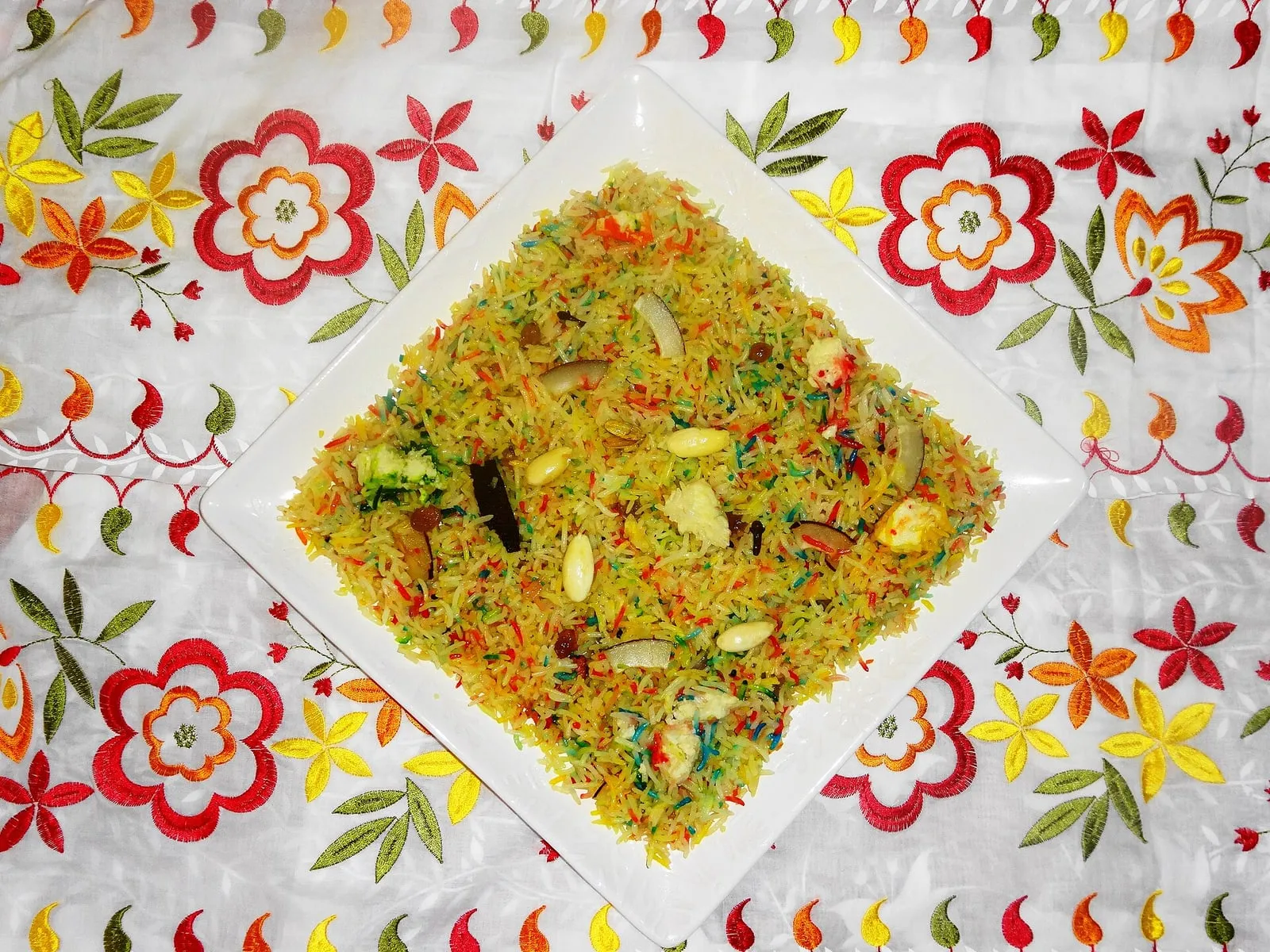 Zarda sweet saffron rice topped with nuts and raisins